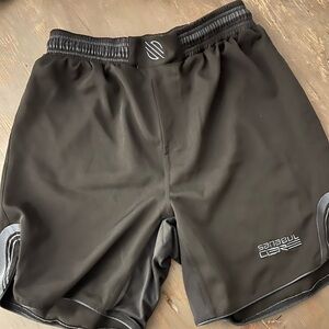 Lot of Sanabul BJJ nogi grappling shorts and Sanabul nogi rash guard